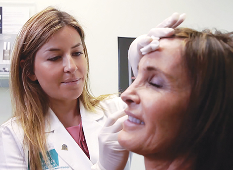 dermatologist injecting Juvederm dermal filler into a patient in San Diego, CA