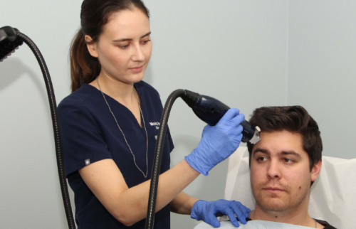 male patient from san diego undergoing a microneedling treatment