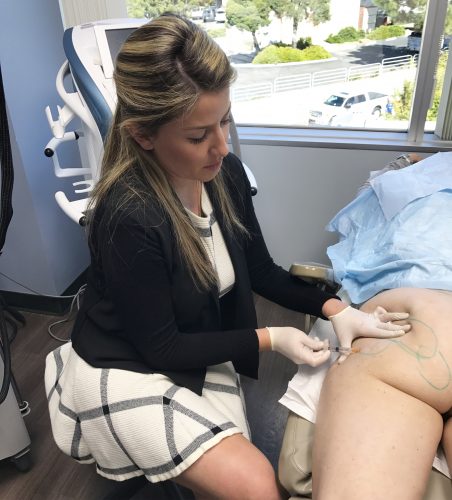 doctor performing cellulite treatment on a patient from San Diego