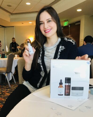 Dr. Boen with her favorite SkinCeuticals skincare products in San Diego