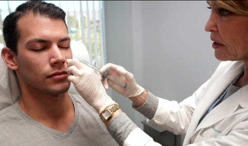 dermatologist in san diego injects Restylane in patient's nose