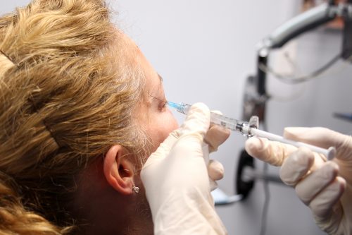 patient receiving injectables to treat aging skin in San Diego