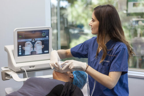 dermatologist, Dr. Monica Boen performing a cosmetic treatment on a patient in San Diego, CA