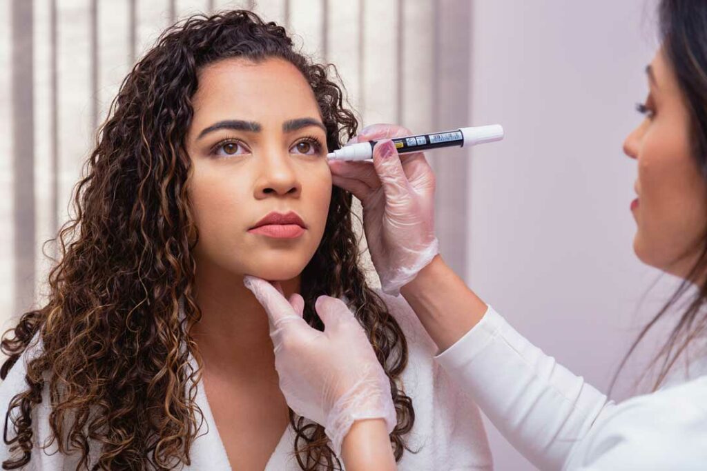 stock photo of a woman getting a  facial rejuvenation in san diego