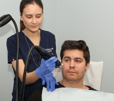 doctor performing an rf microneedling treatment on a patient from san diego, ca