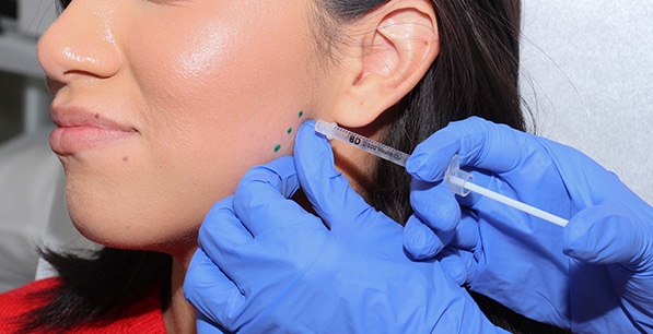 patient getting botox cosmetic treatment
