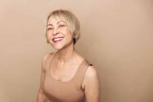 blonde middle aged woman smiling